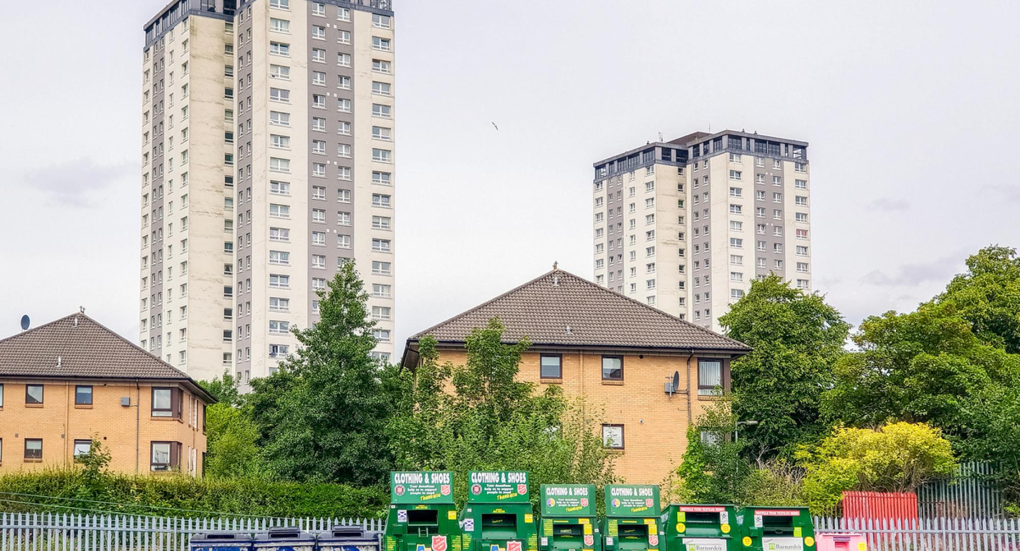 A series of recycling and charity donation containers in the Knightswood area of Glasgow.