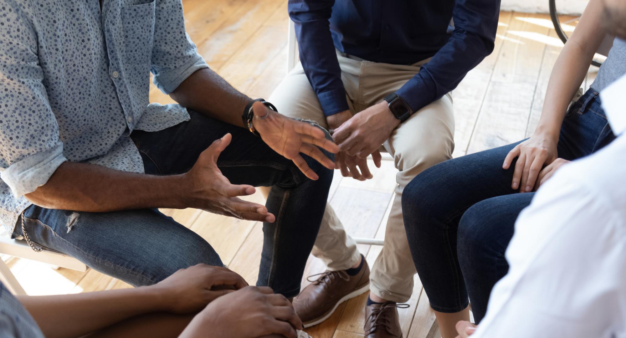 People being supported at a drug support group