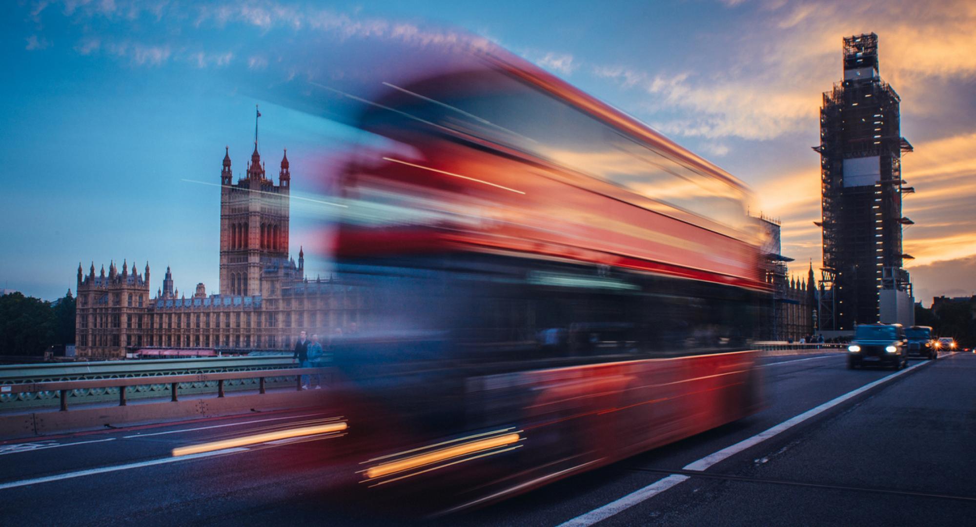 bus crossing westminster bridge in london