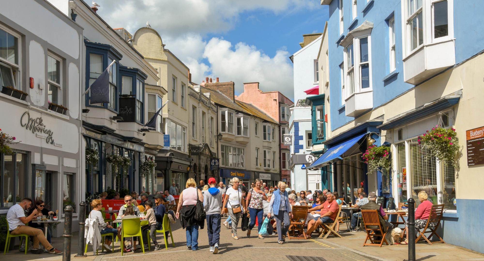 People on busy street in Tenby