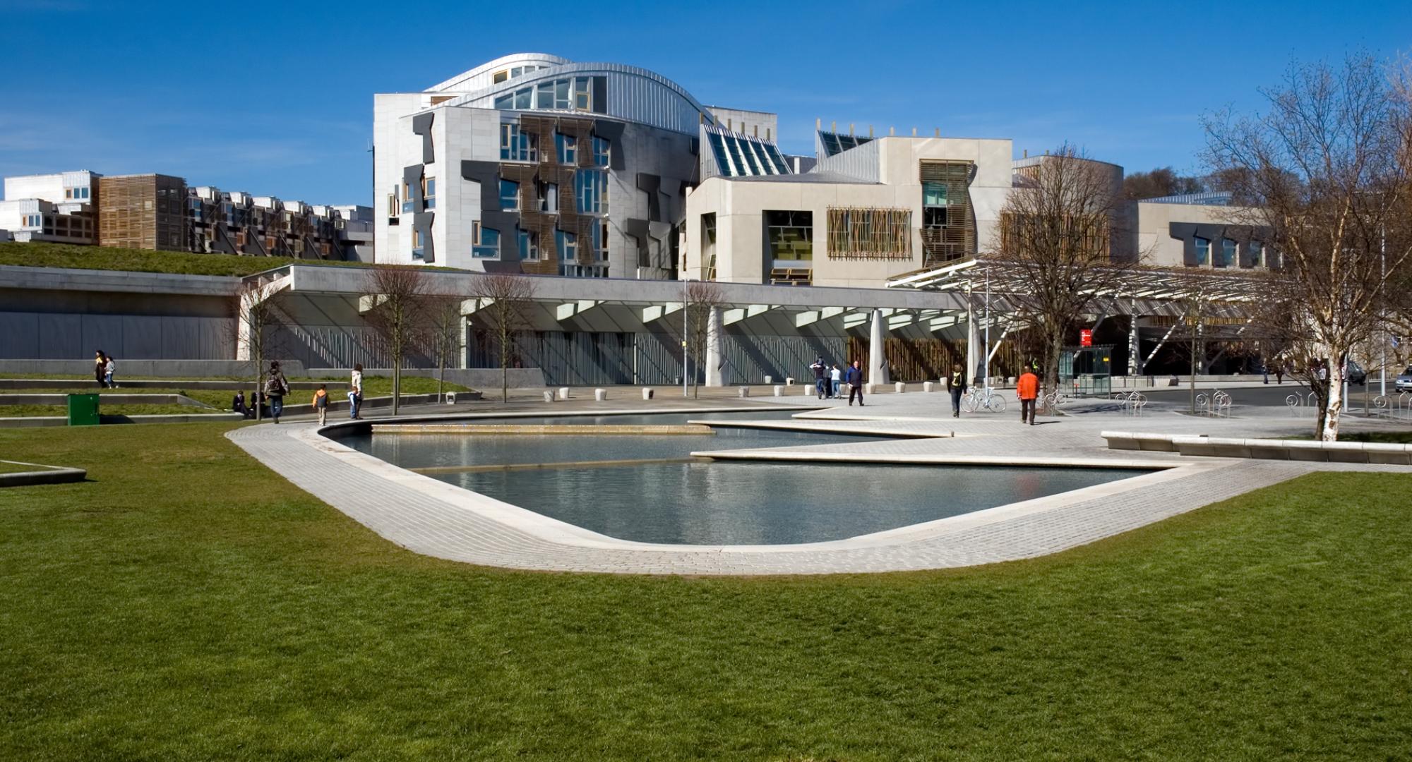 Far range photo of Scottish Parliament building on sunny day