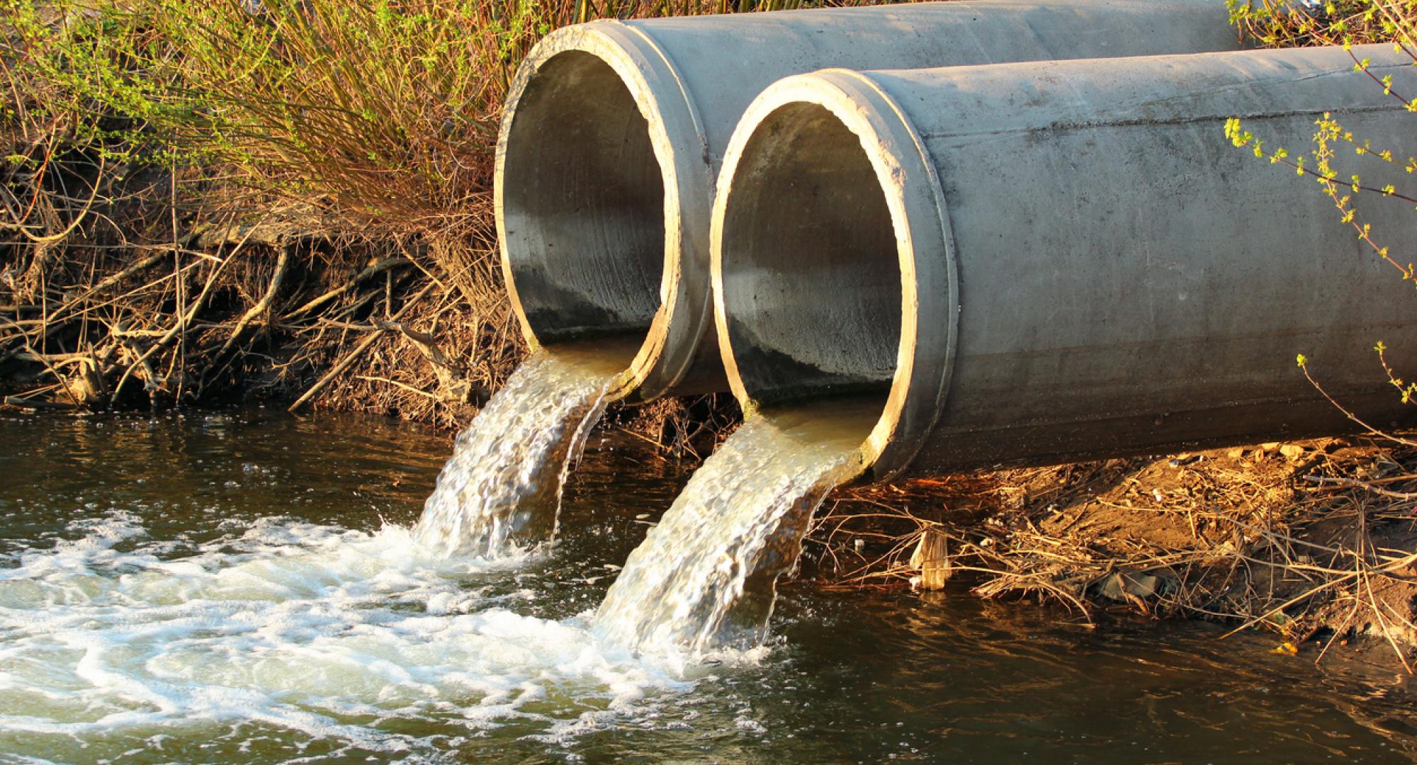 Discharge of sewage into a river