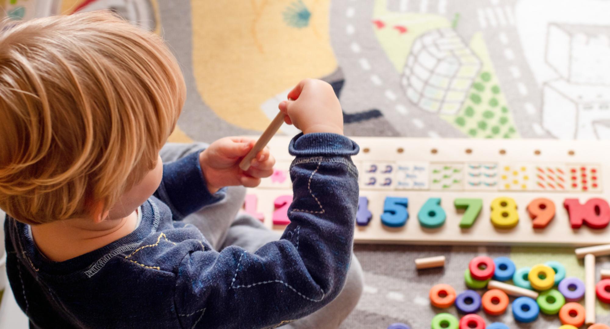 Child playing with toys