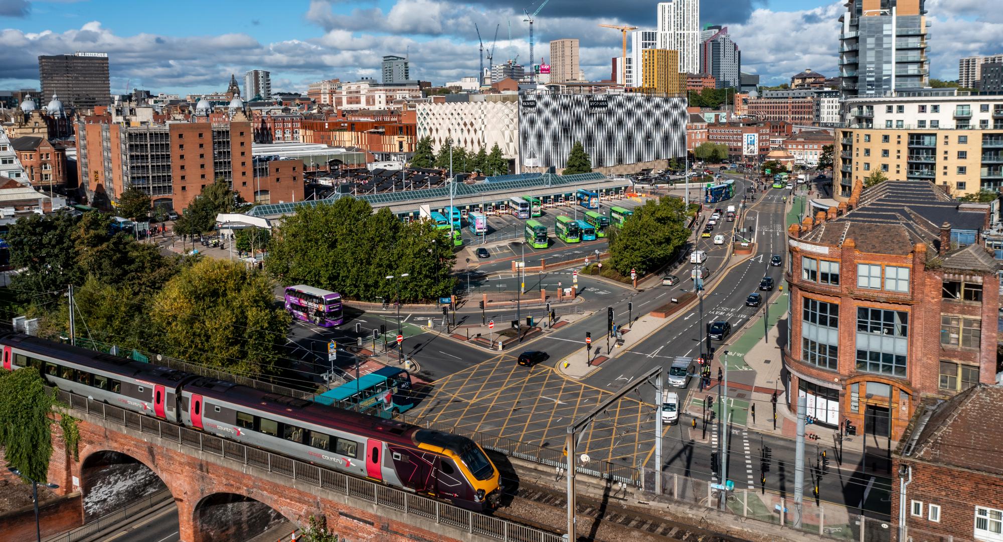 Aerial view of Leeds with train in foreground