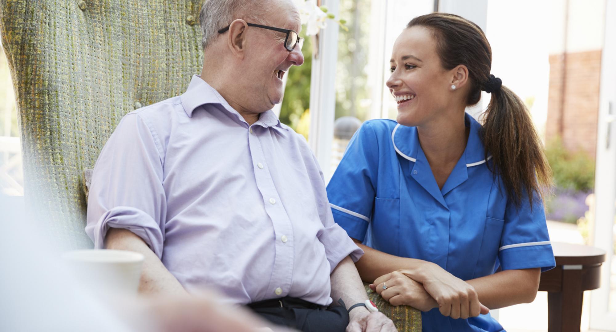 Carer sat with patient