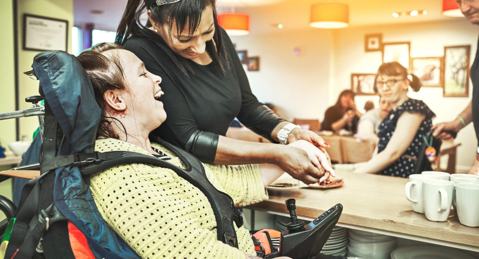 Children's social care worker with a disabled child