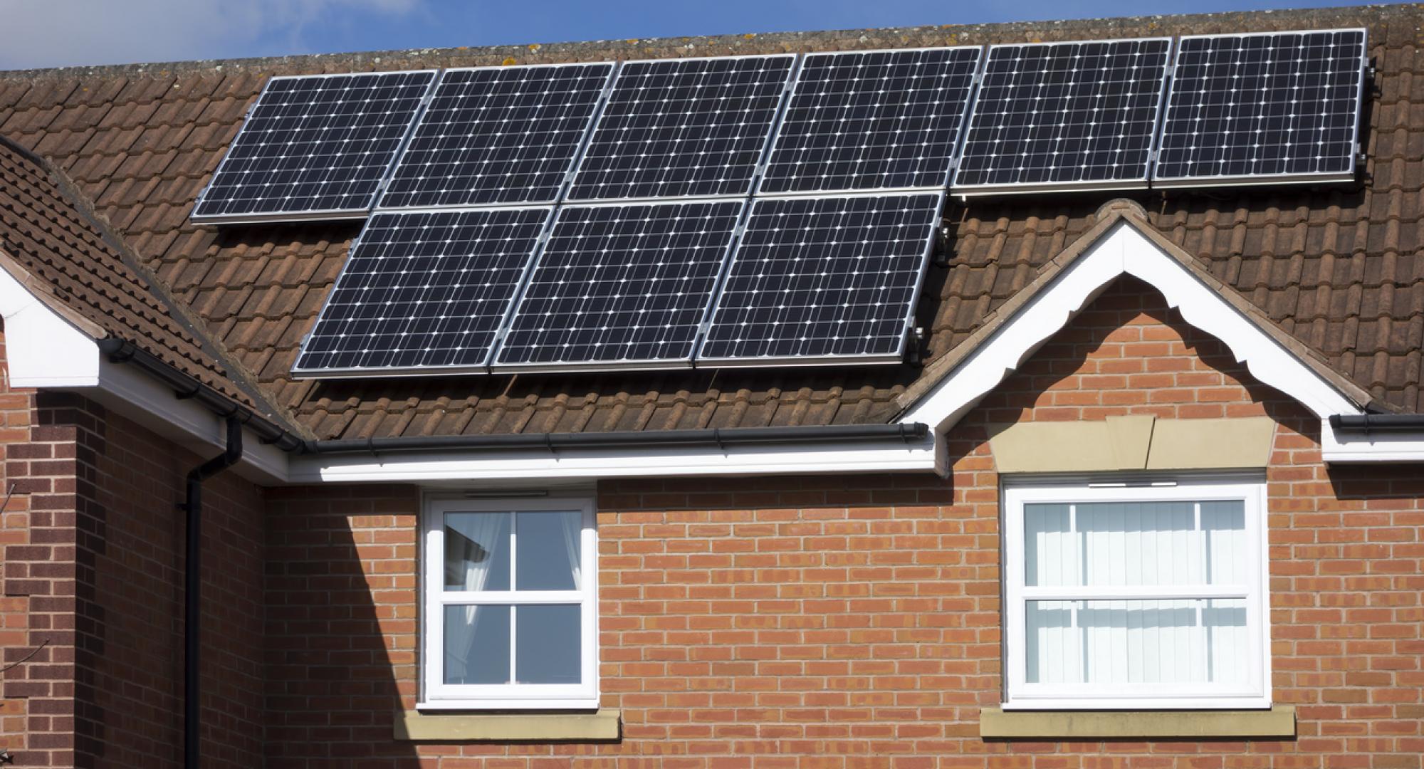 House with solar panels on the top