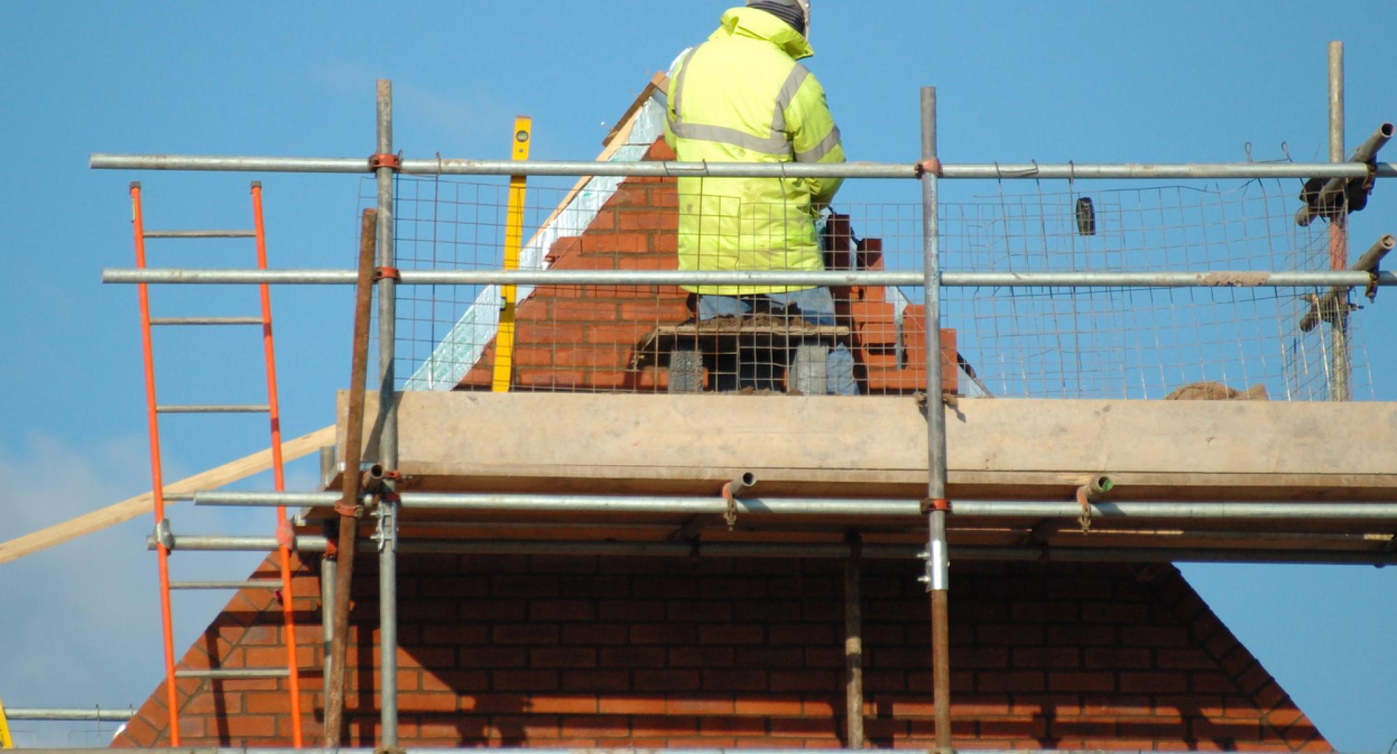 Man building a house