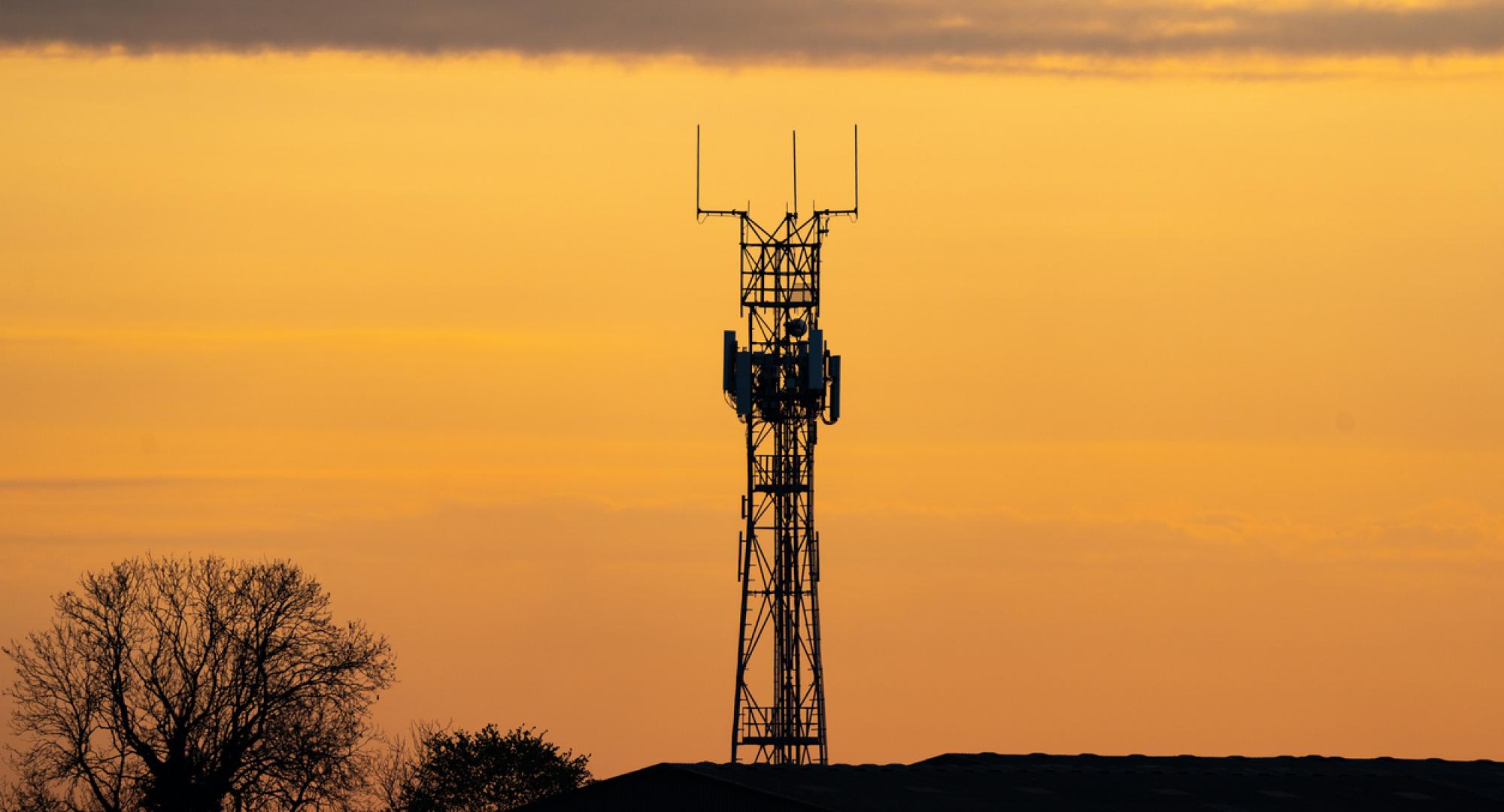 5G tower at sunset