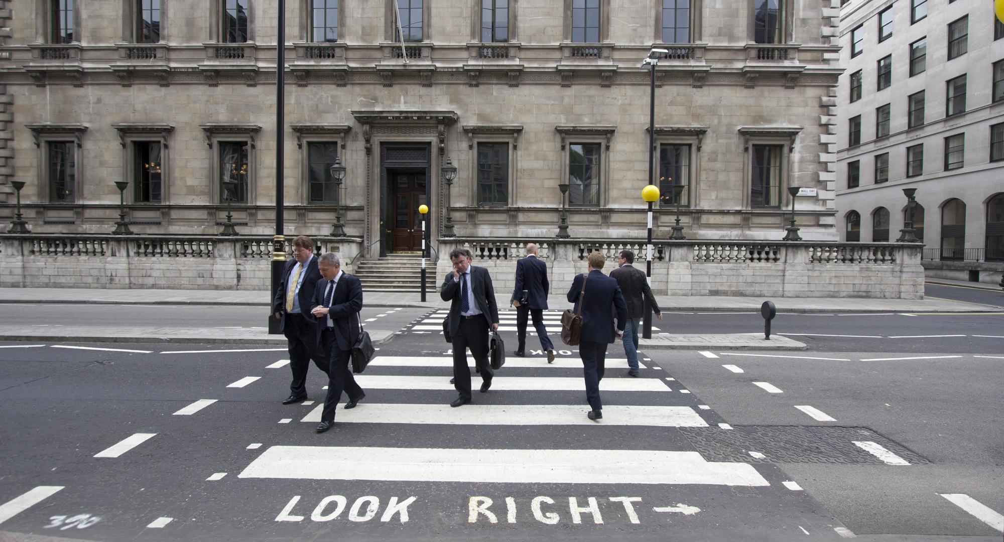 Civil servants crossing the road in London