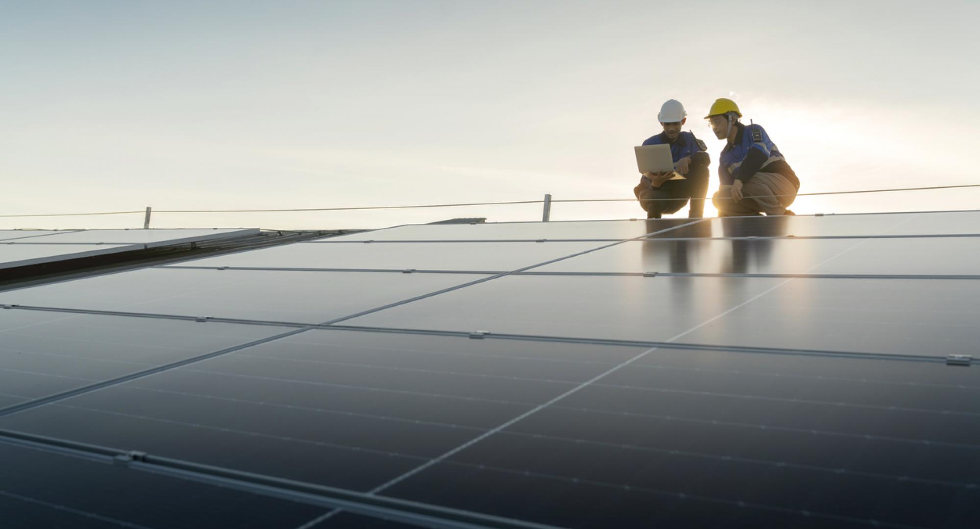 Engineers team survey check solar panel roof