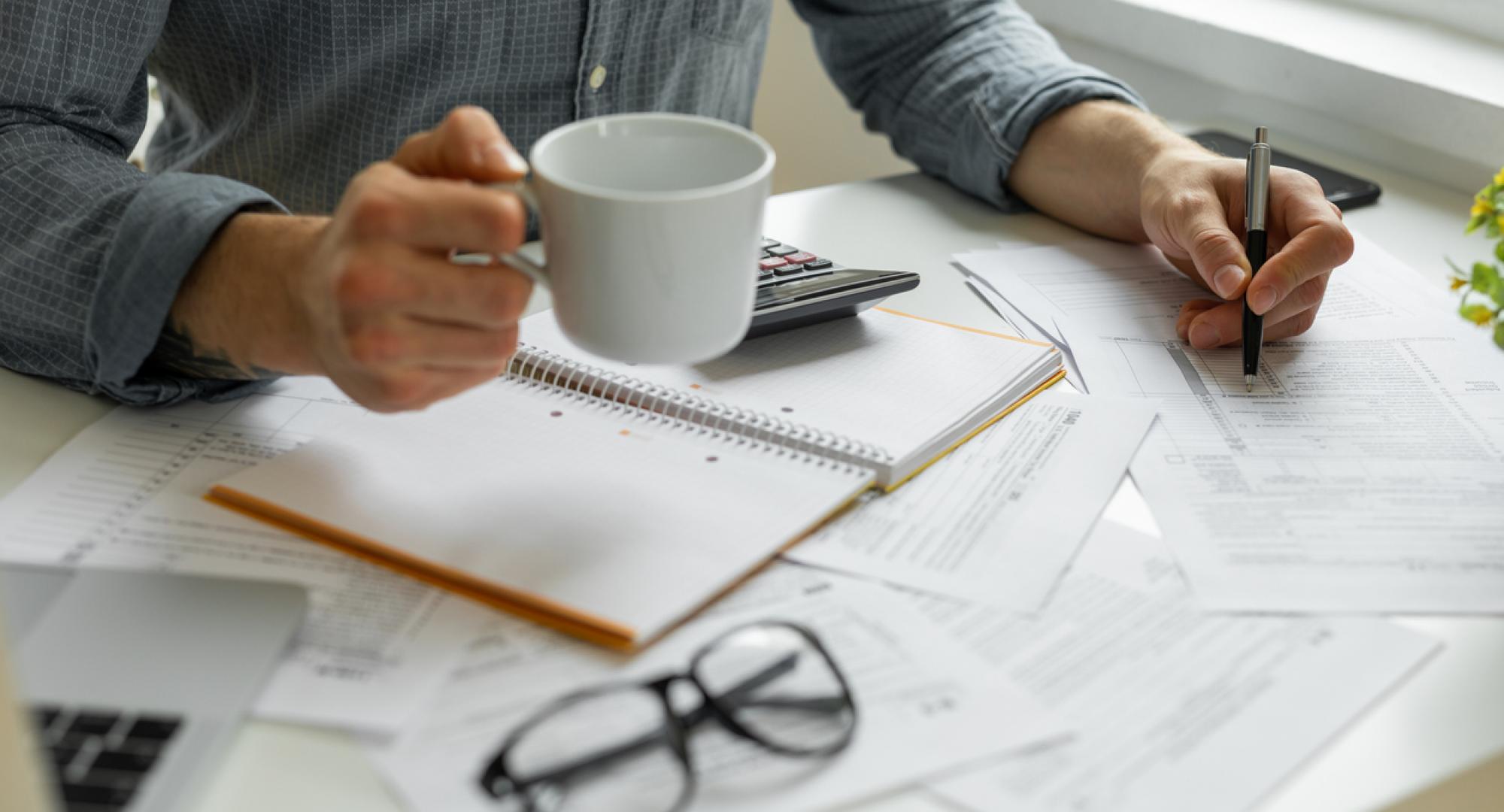 Man doing financial paperwork