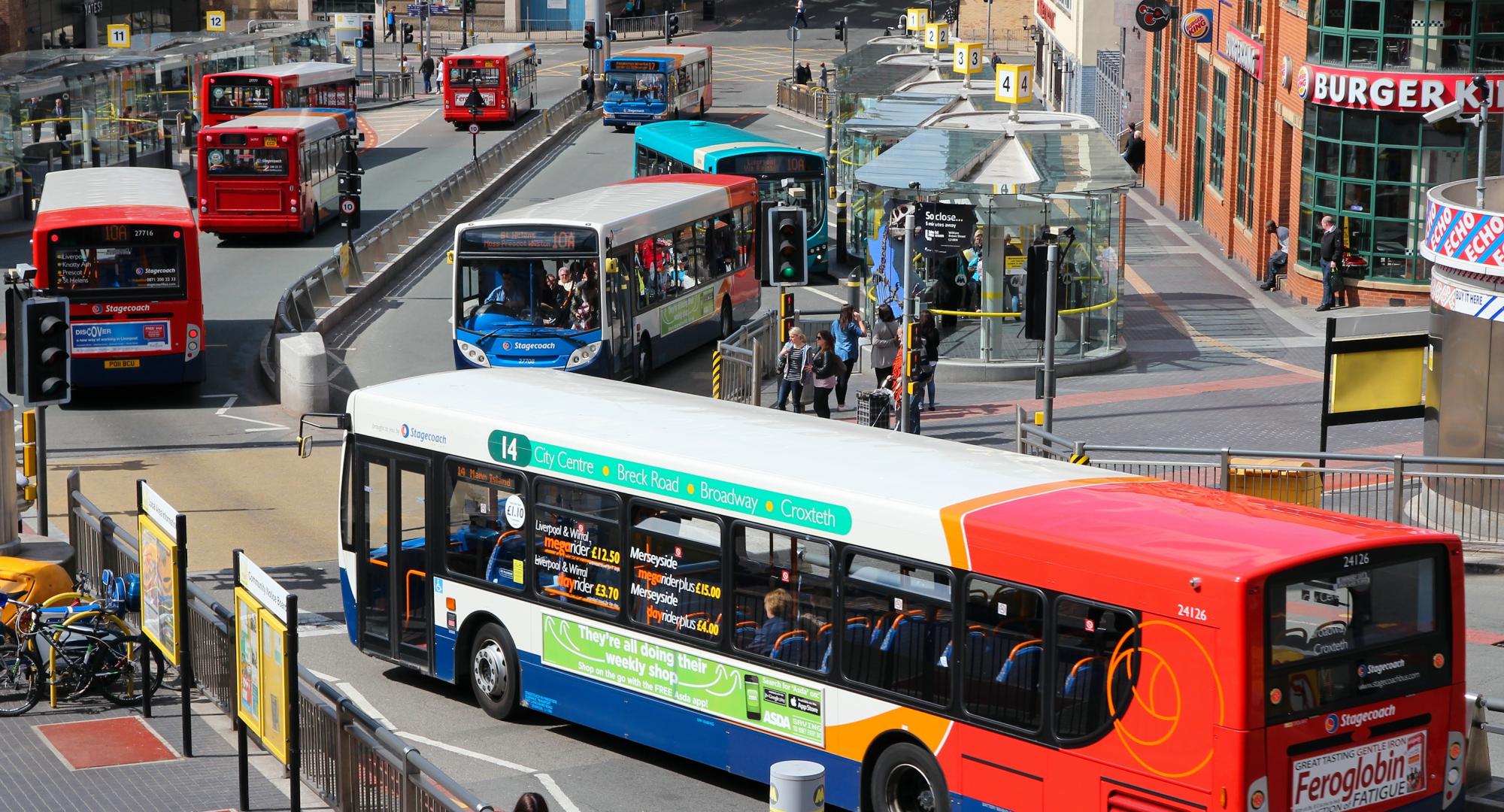 People ride StageCoach buses on in Liverpool, UK.