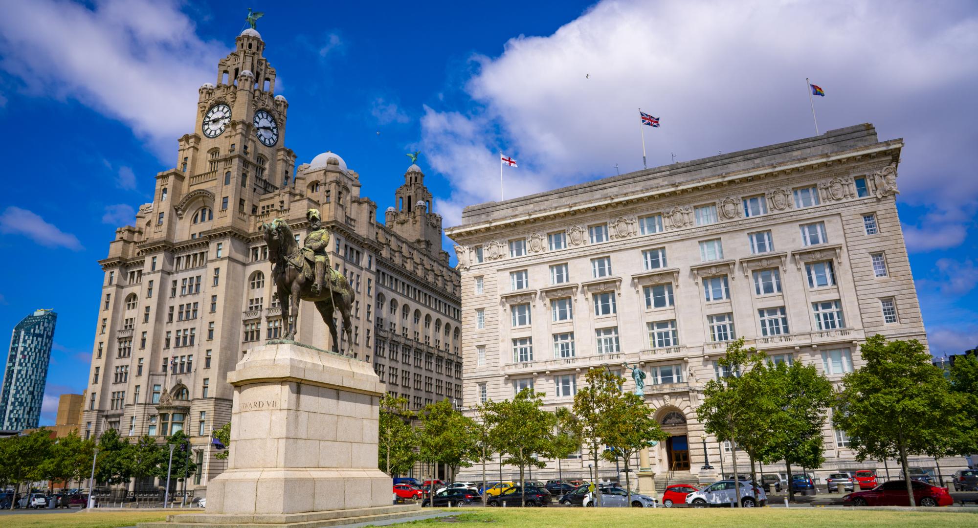 Liverpool Pier head Edward Vll Statue with Royal Liver building and Cunard building in England UK United Kingdom