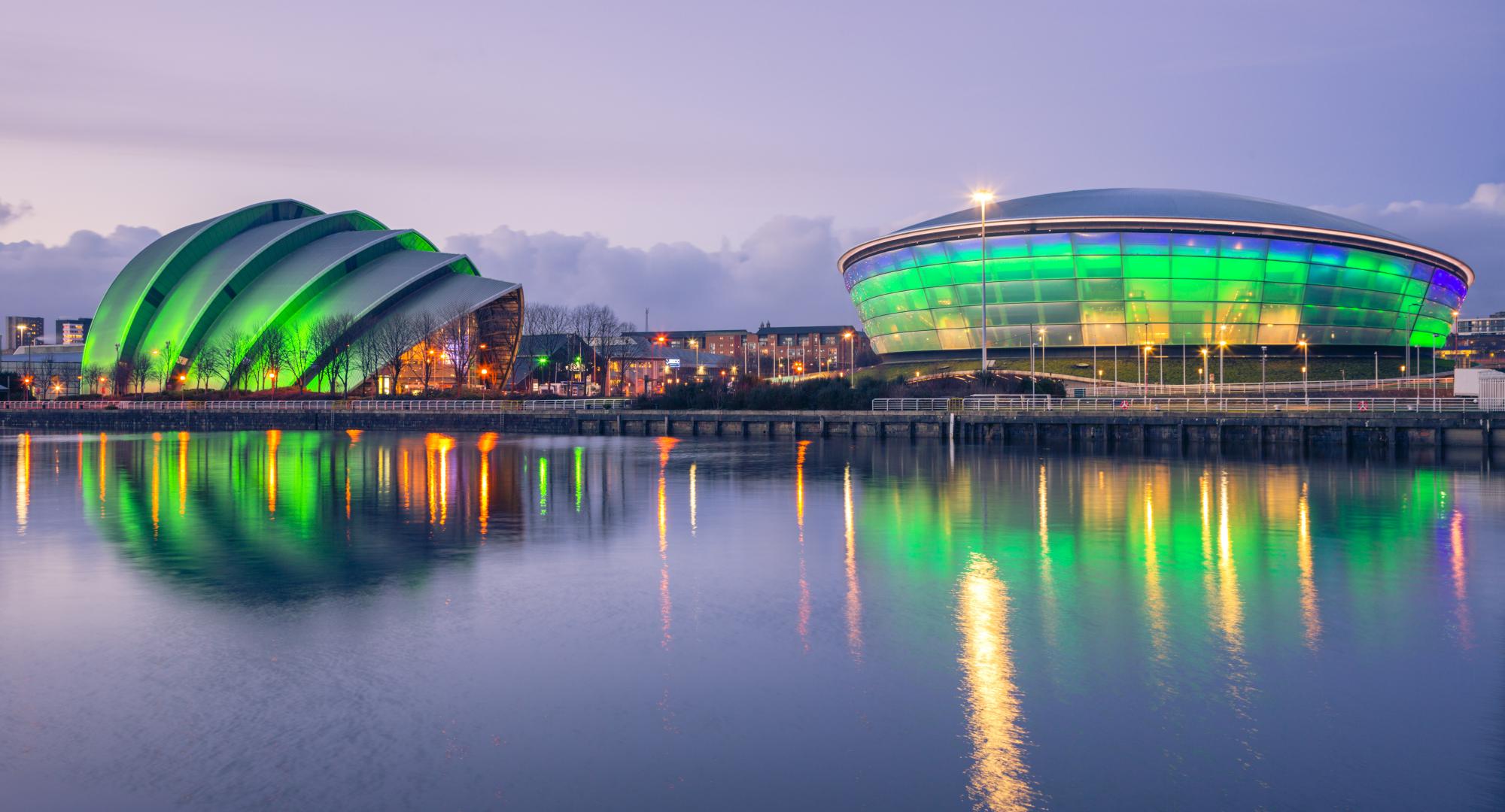 The Scottish Exhibition and Conference Centre Clyde Auditorium and the Scottish Hydro Arena lit up green at night