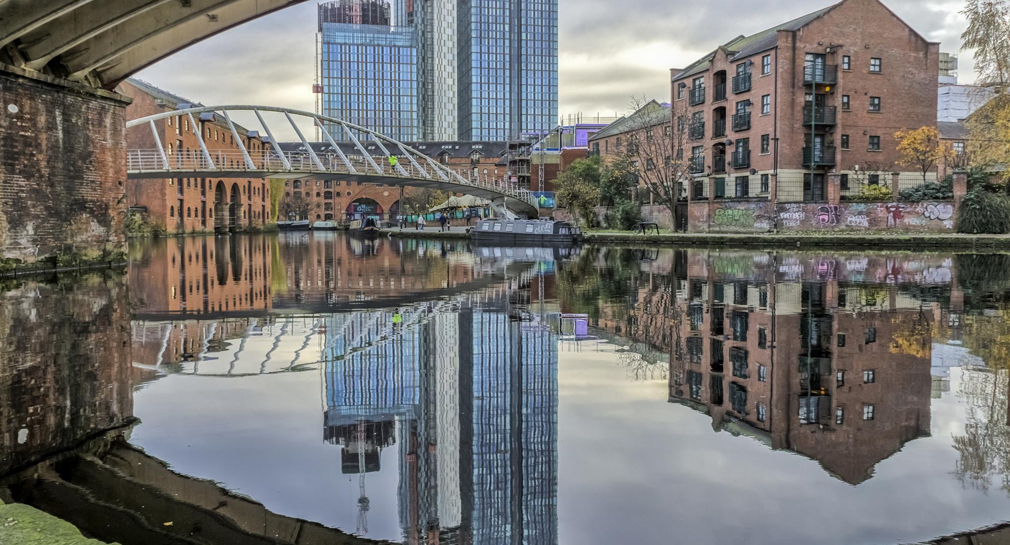 View across the canal at Castlefied in the centre of Manchester, UK