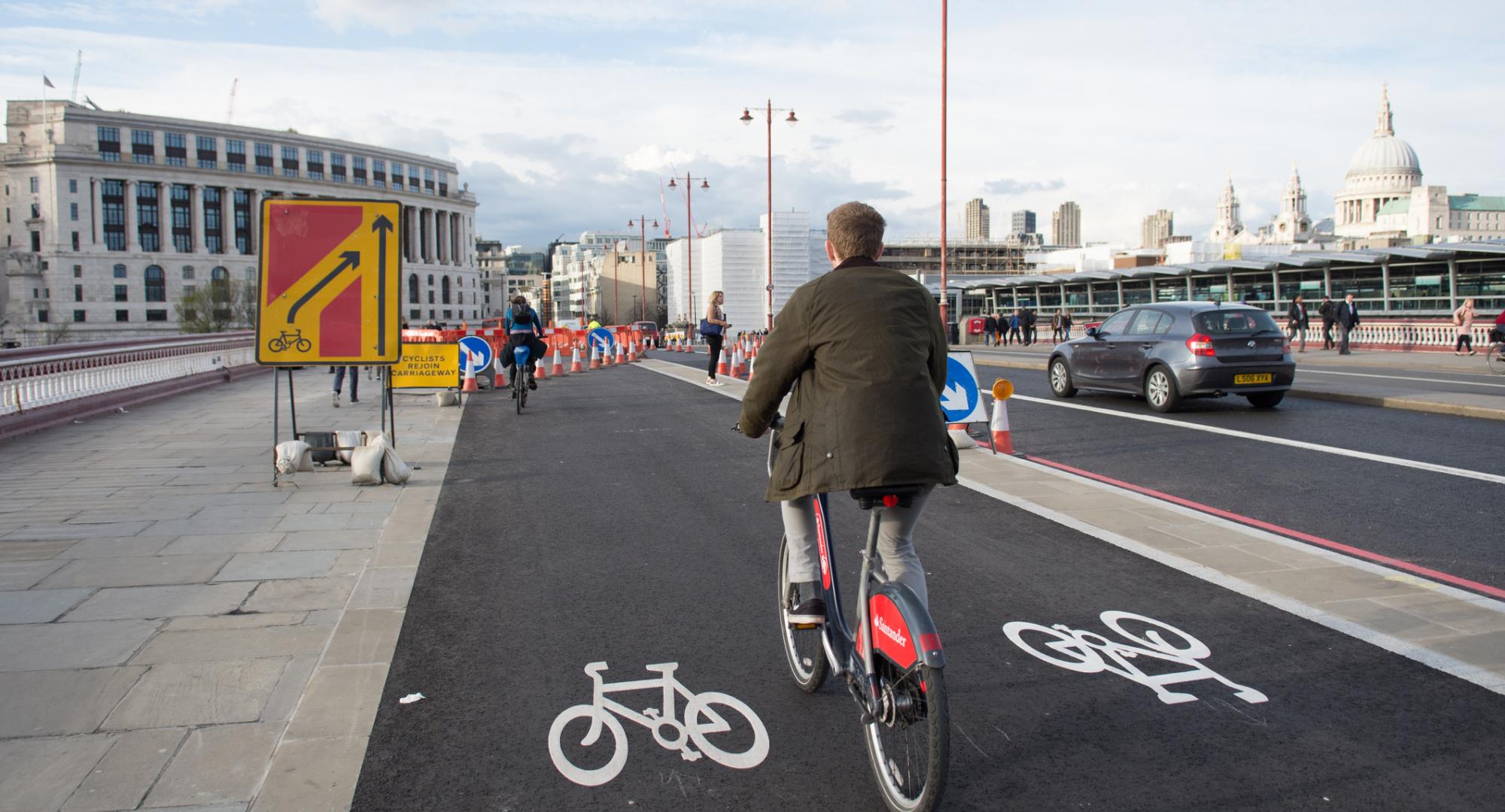 Cyclists using the new TfL Cycle Superhighway on Blackfriars Bridge in central London