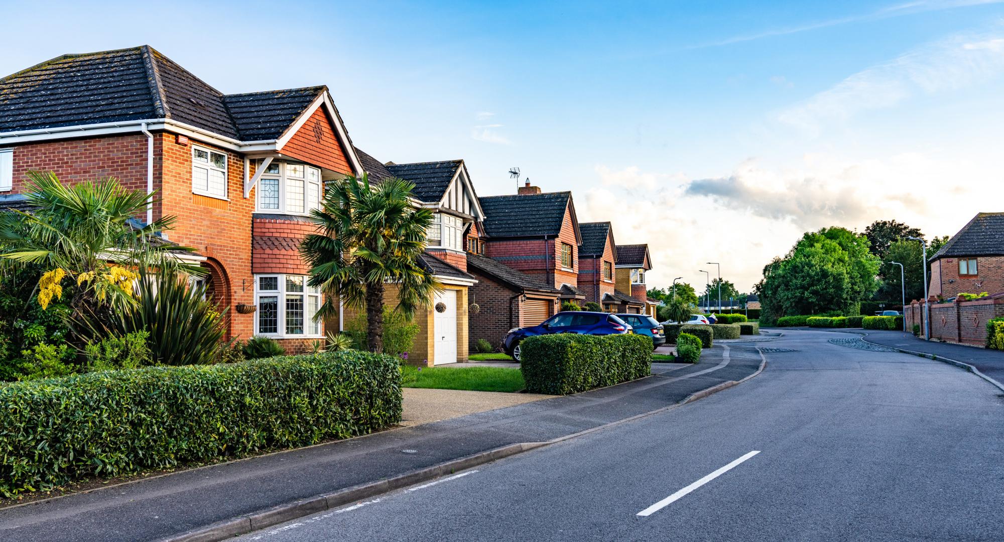 A street on a modern, brick built housing development in the UK