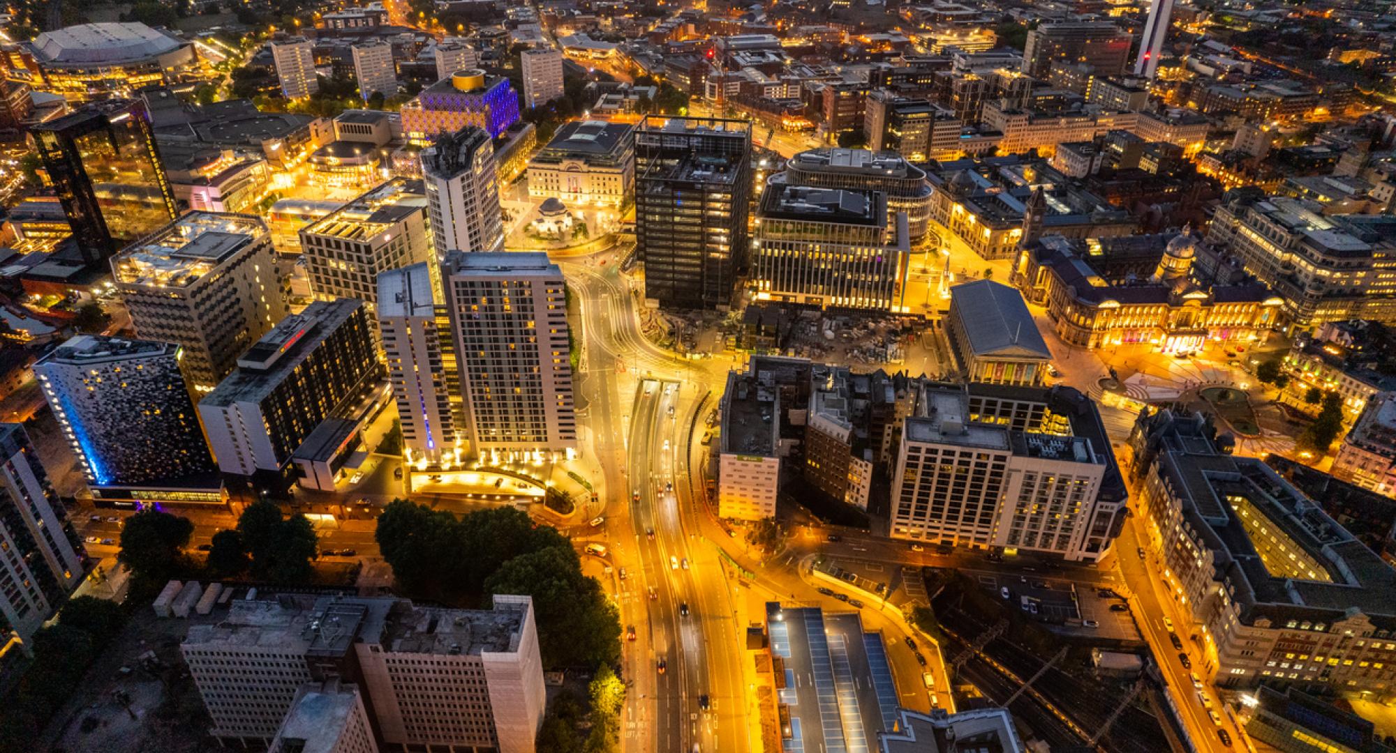 Aerial view over Birmingham city centre by night