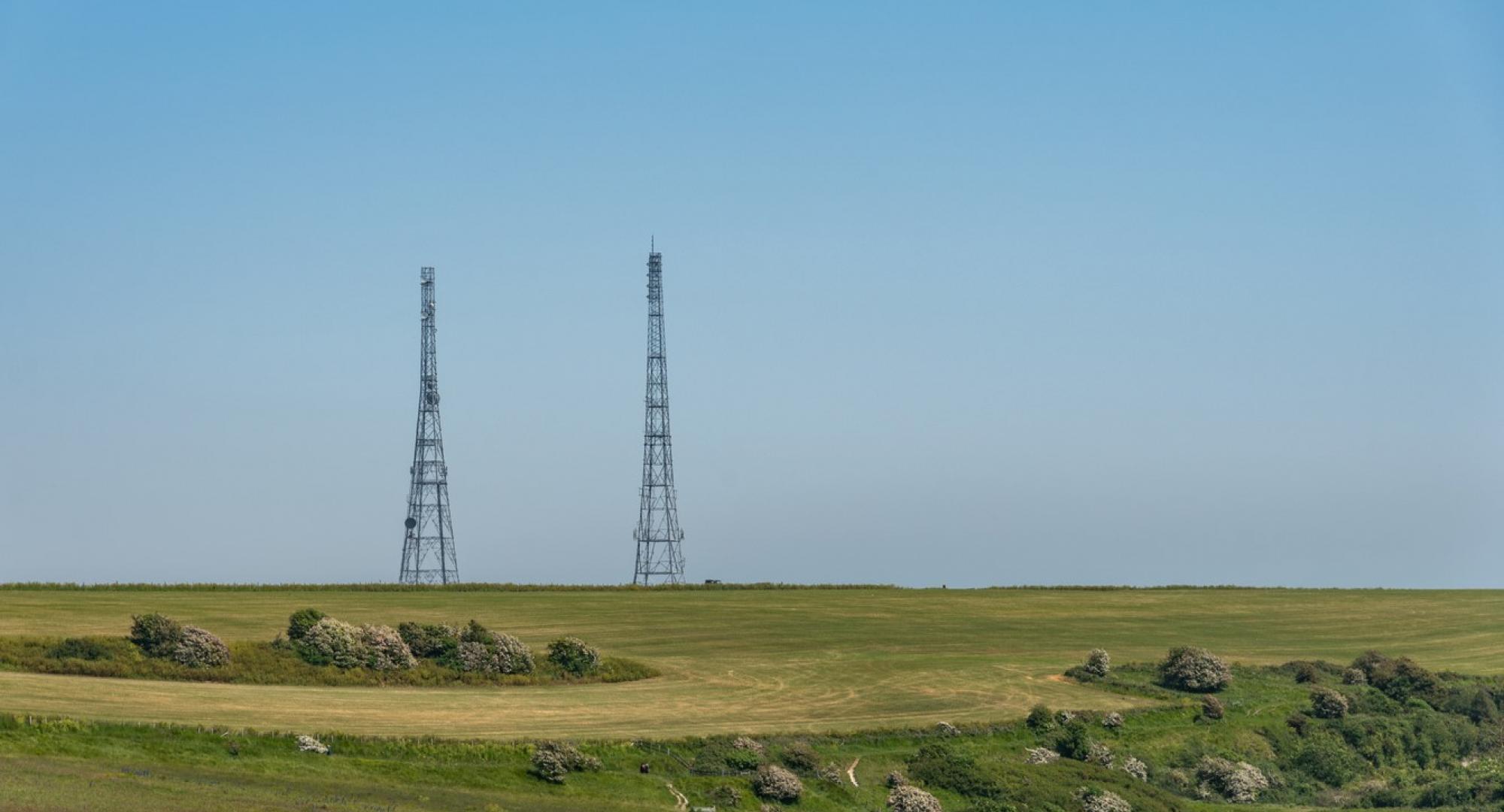 Antenna telecommunication against blue sky.