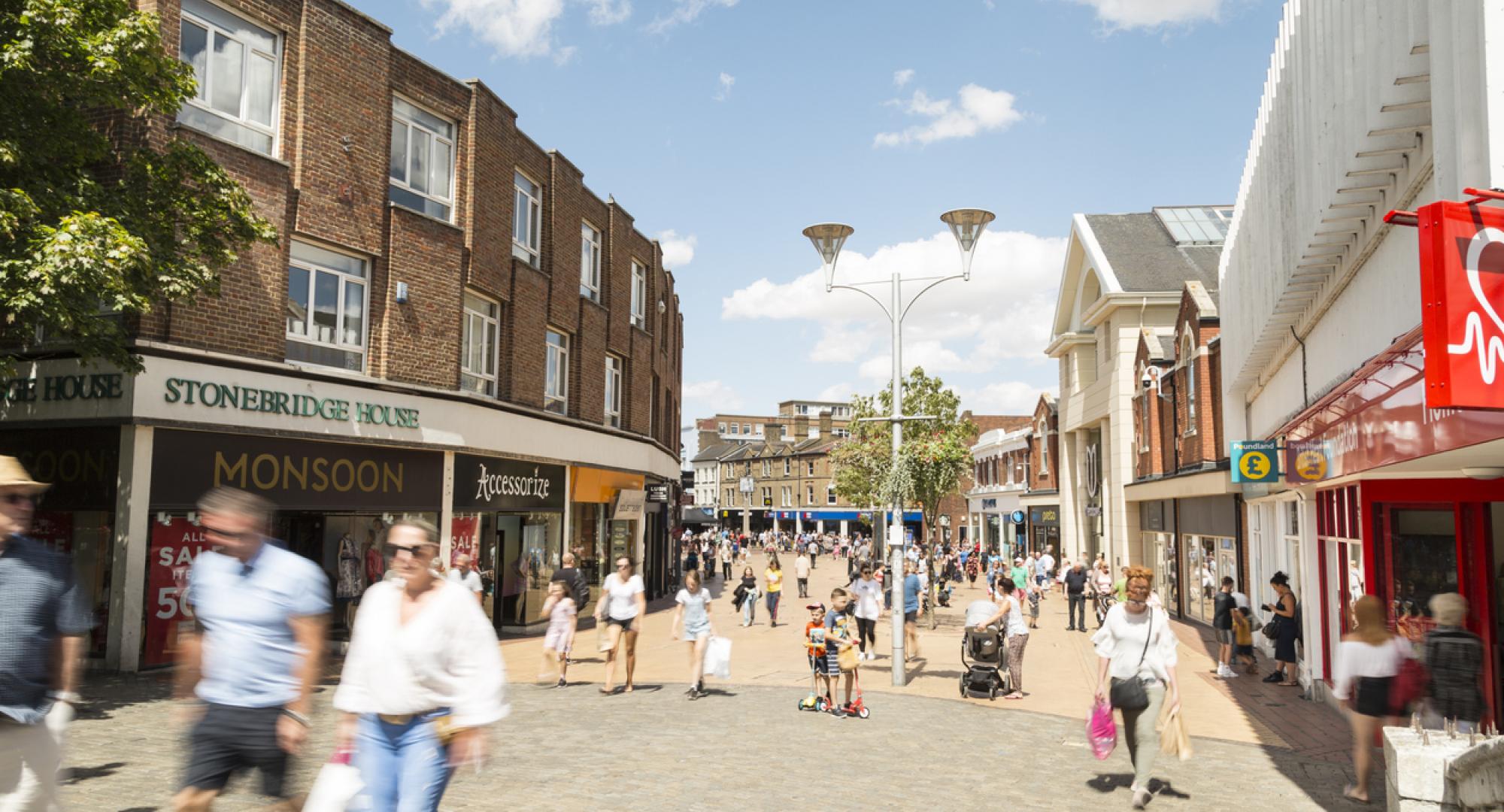 British people enjoying walk in sunny nice weekend on the Chelmsford High street