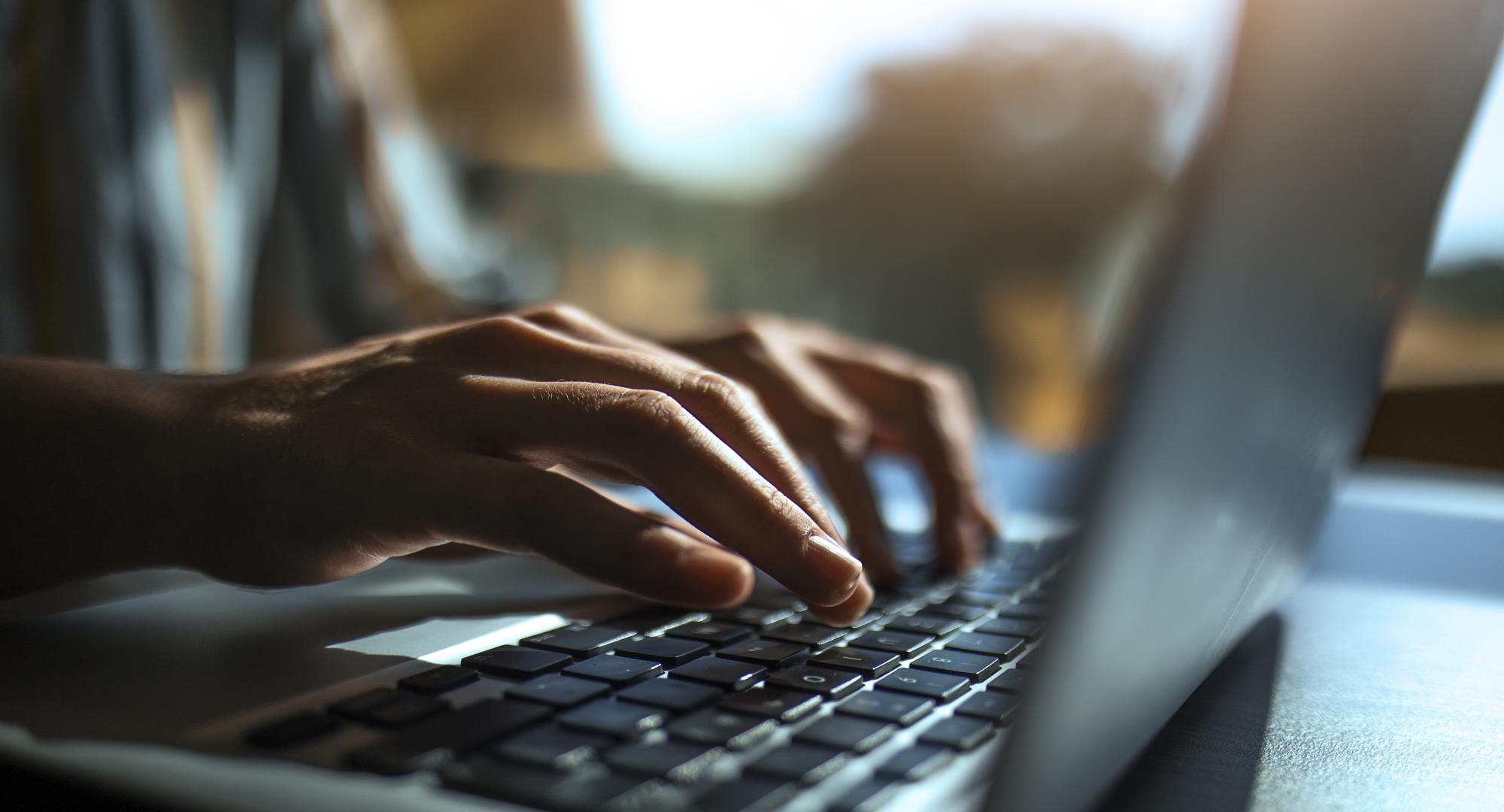 Close up of a hands on a keyboard