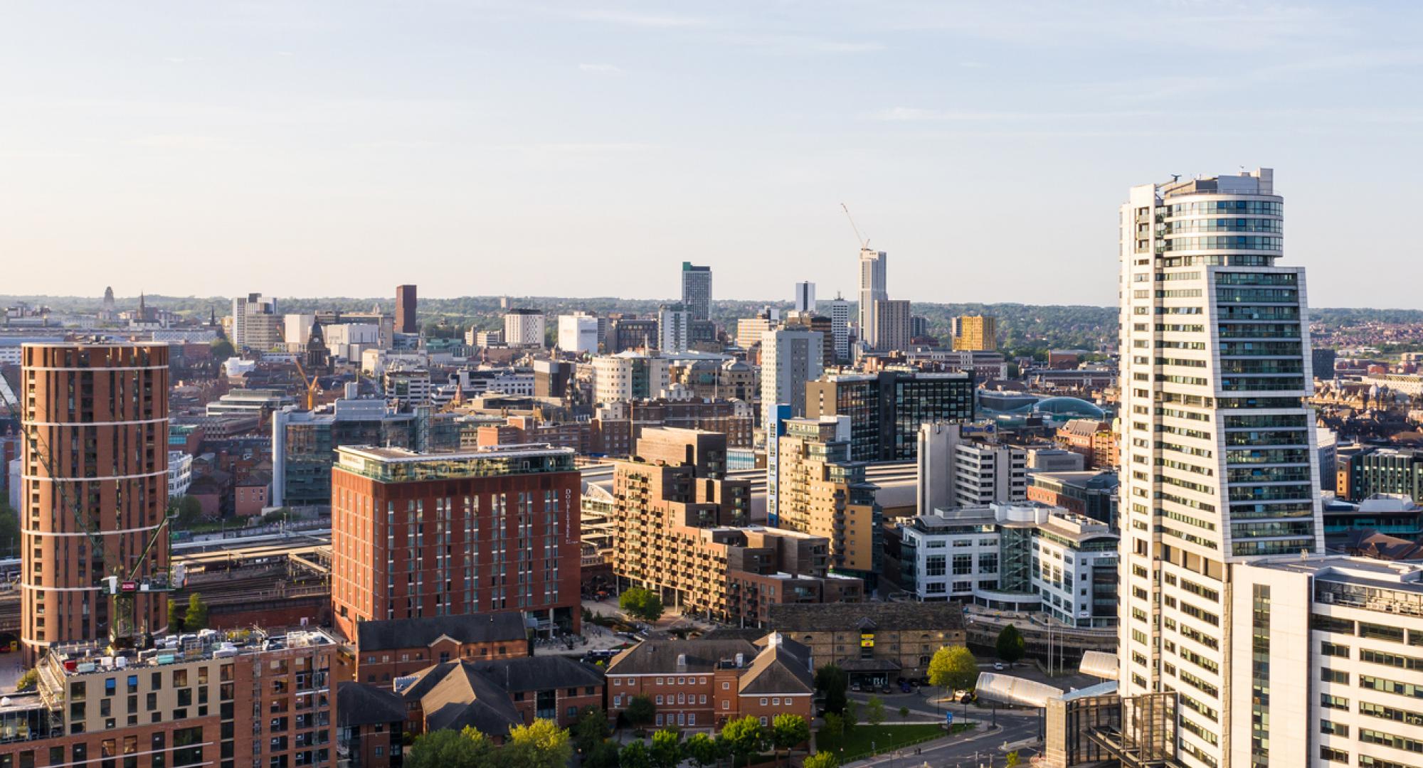 Aerial view of Leeds city centre skyline in West Yorkshire at sunset