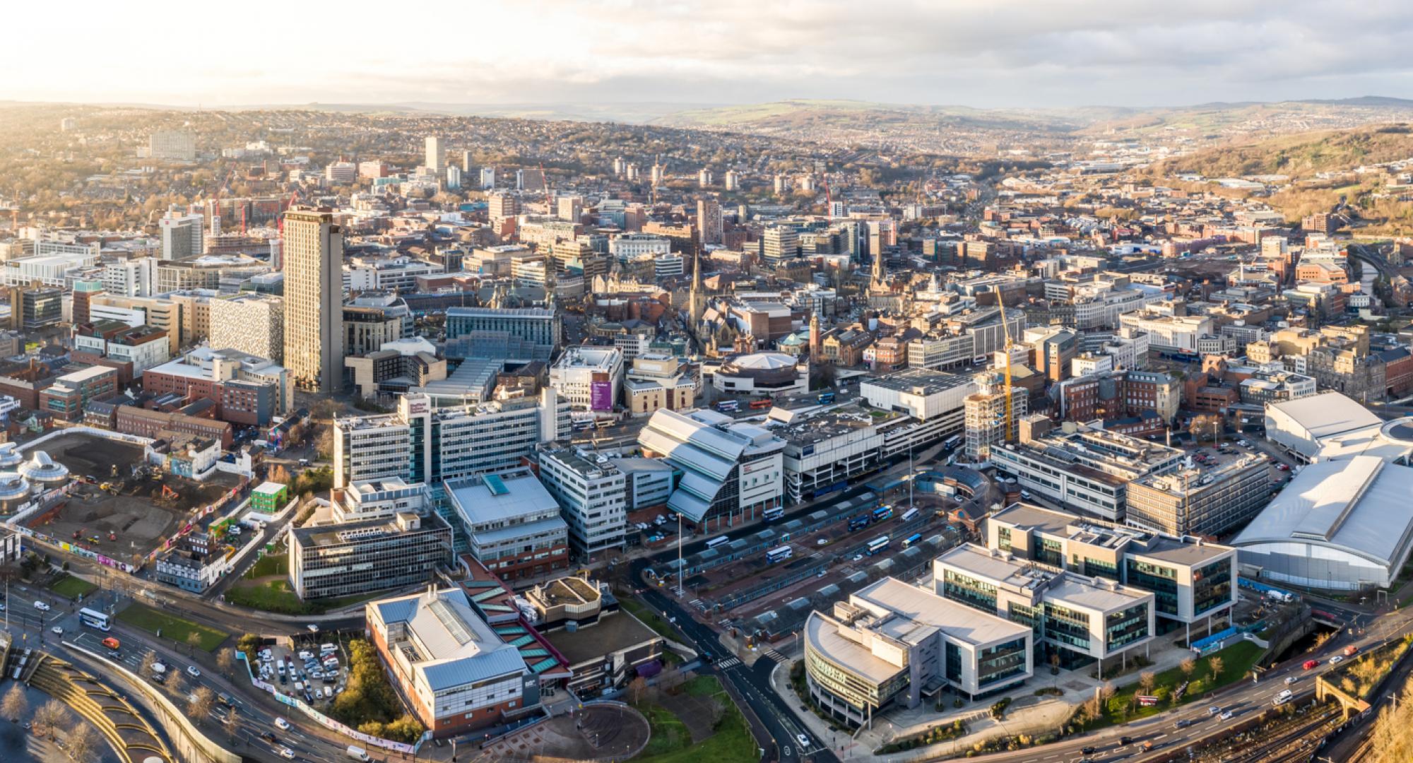 Aerial view of Sheffield city centre skyline at sunset