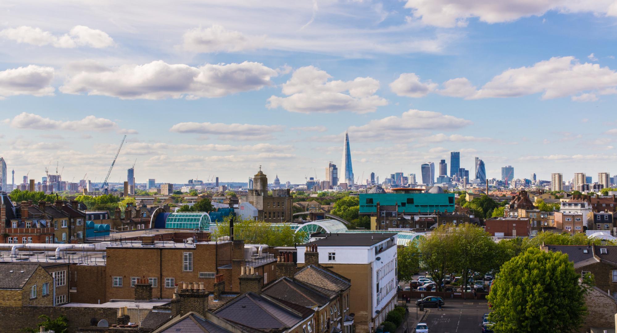 Residential area with flats in south London with a view of the city of London and its most iconic skyscrapers