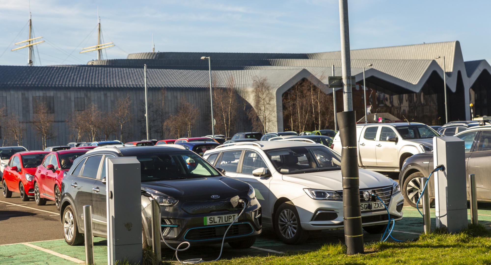 Cars charging electric at station in Glasgow, Scotland