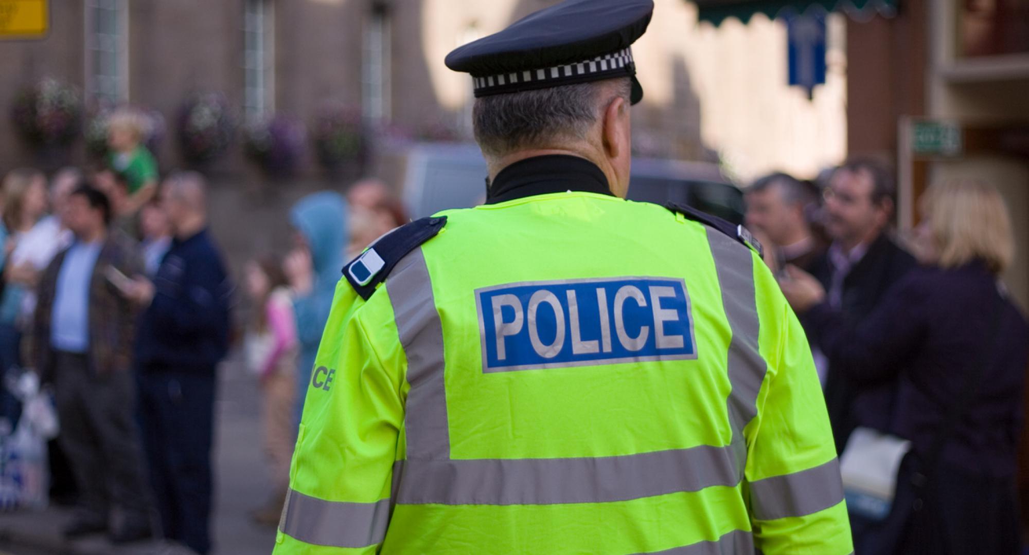 police at crowded street