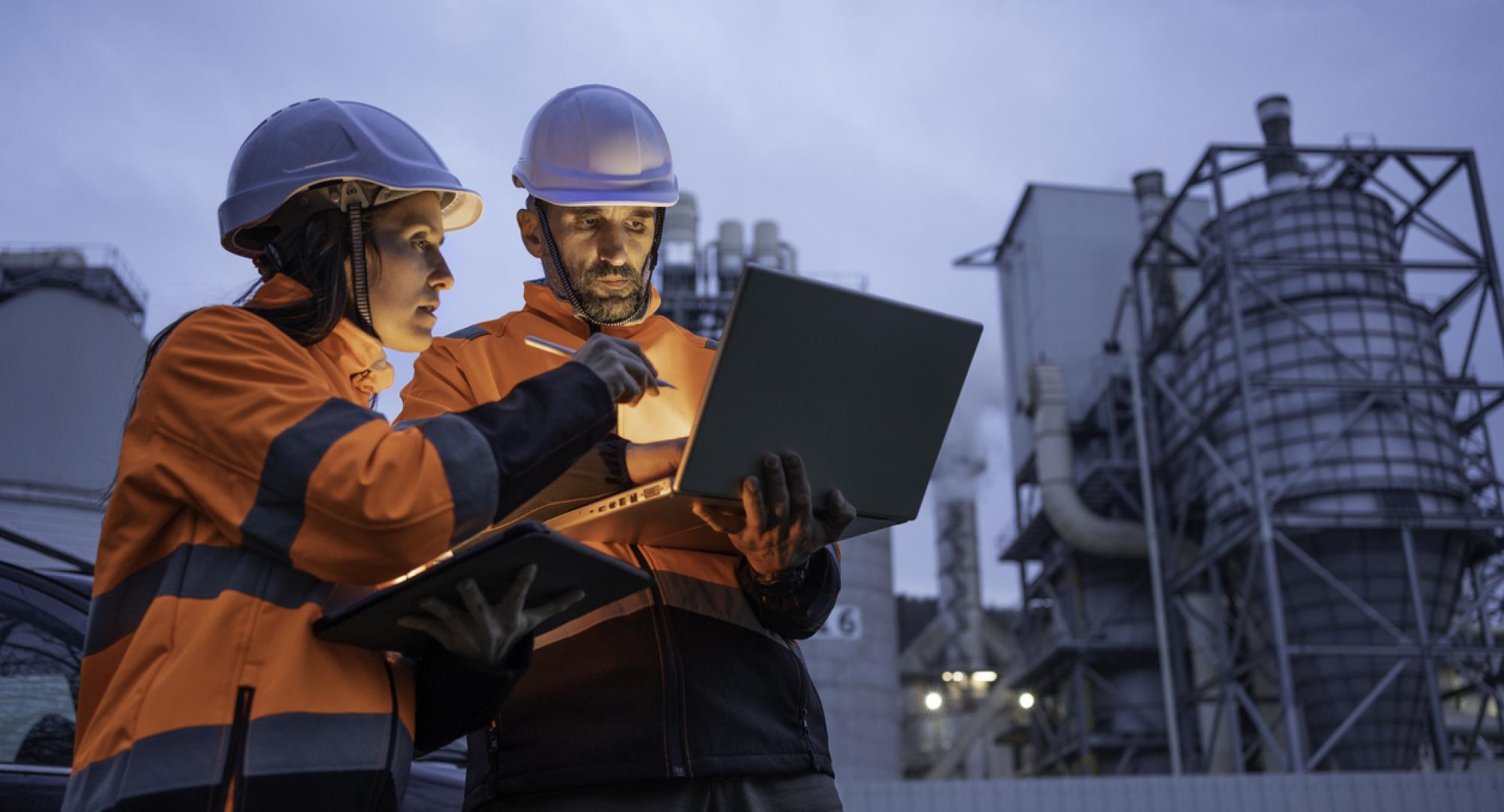 Engineers working late in power plant