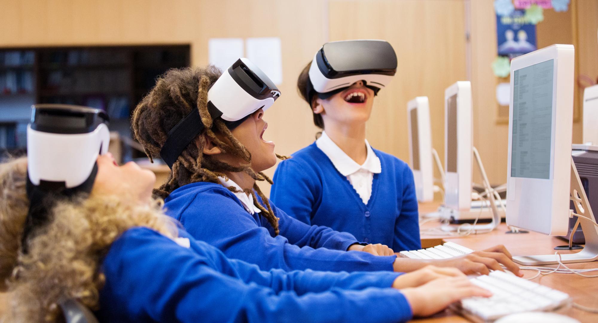 group of students using virtual reality goggles