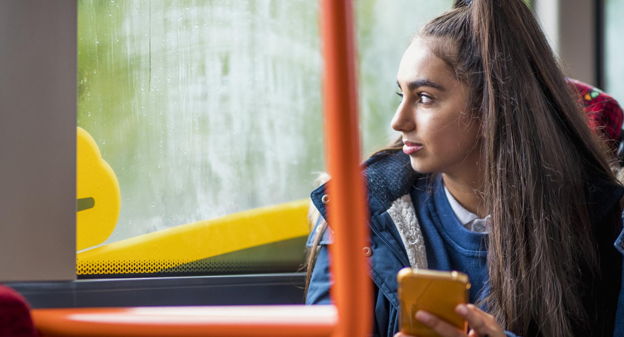 teenage girl commuting to school