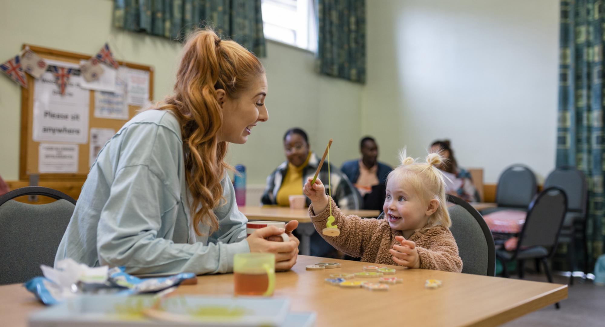 Mother and young girl relying on youth services