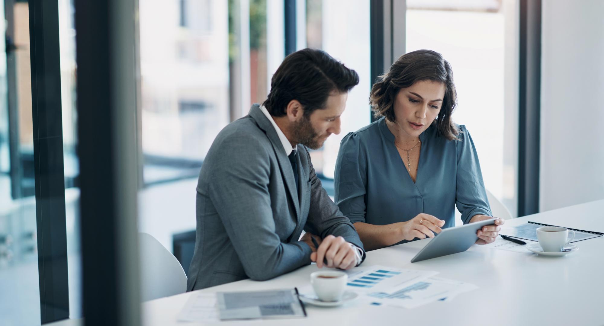 Two people in a business meeting