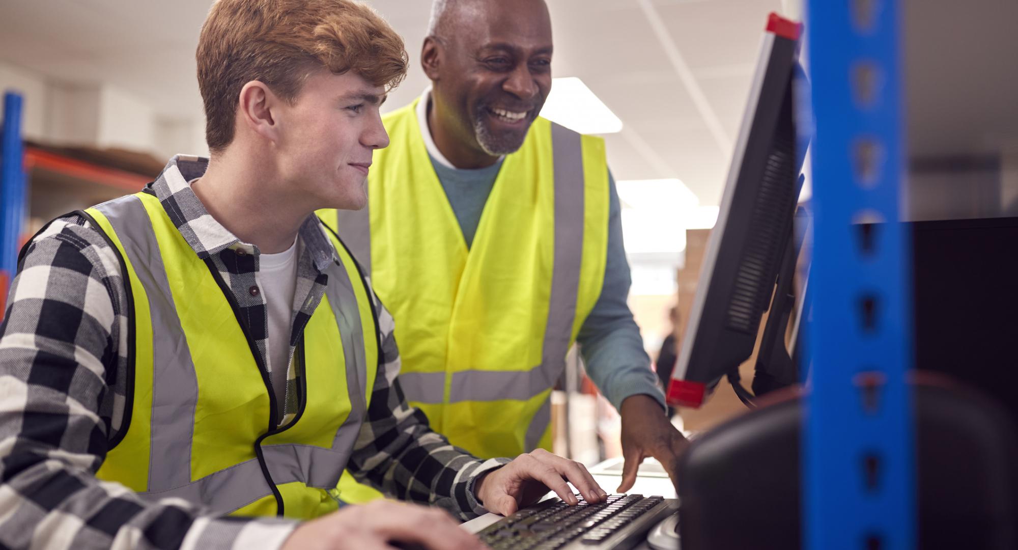 Student on work experience with his mentor