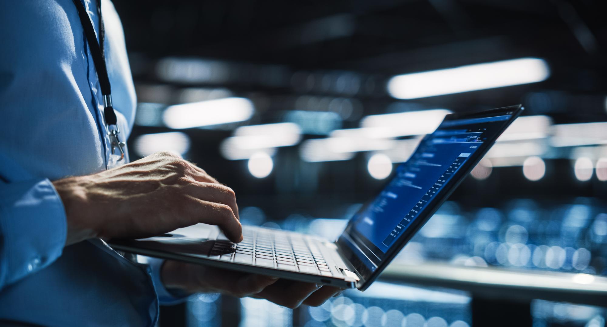 Quantum technology expert using laptop