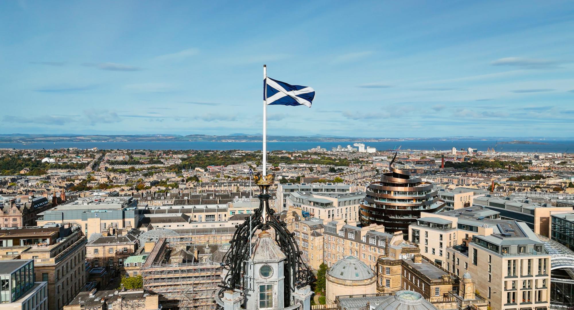 Scottish flag above Edinburgh