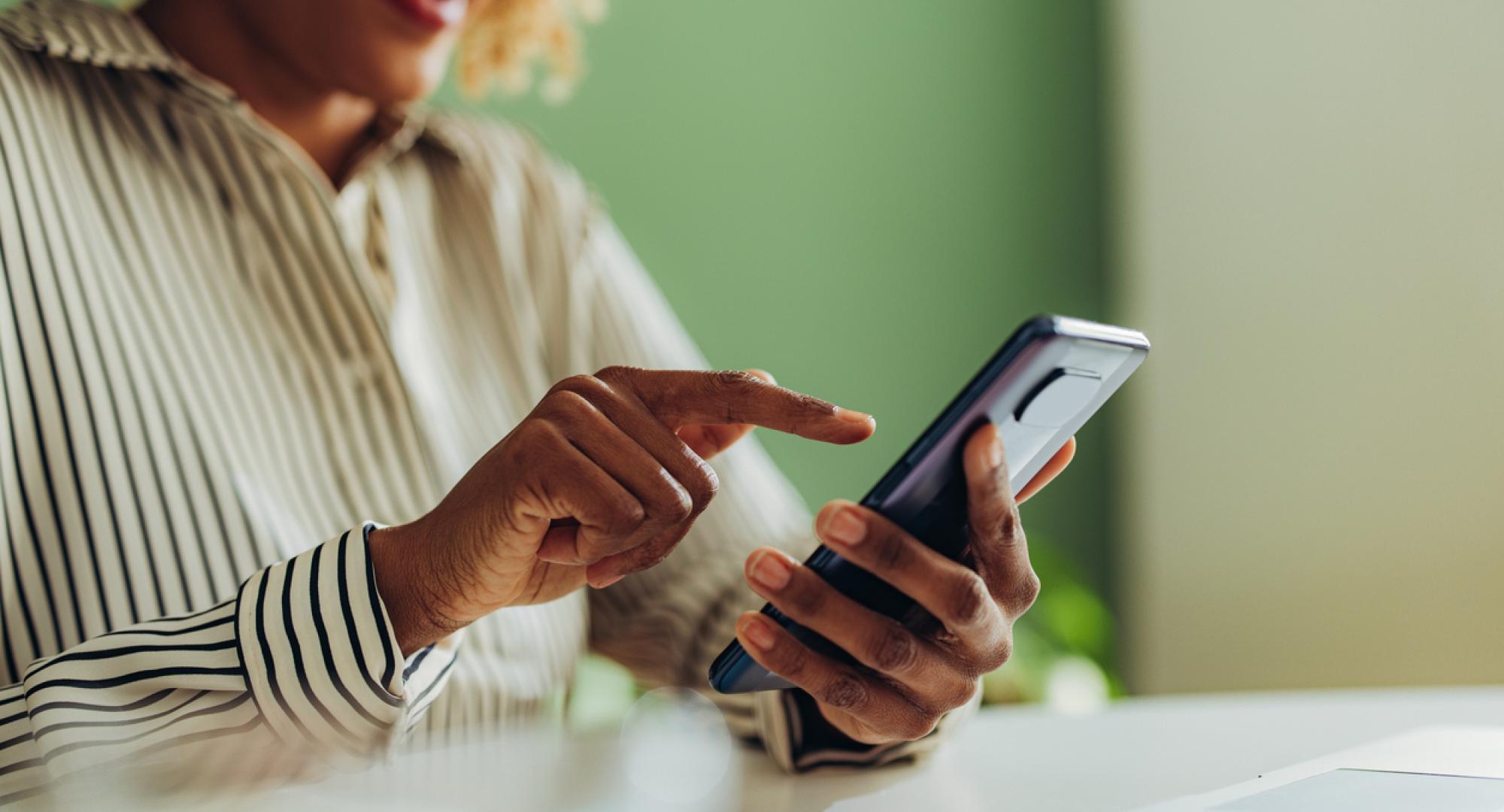 Lady using an iphone app