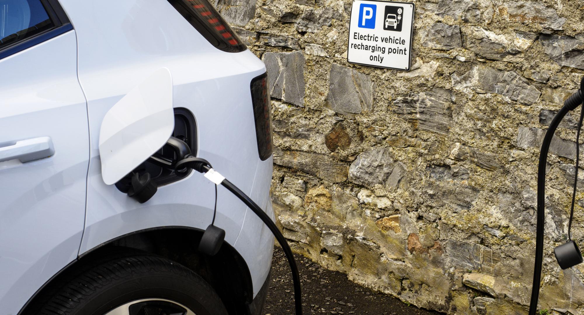 An electric car being recharged