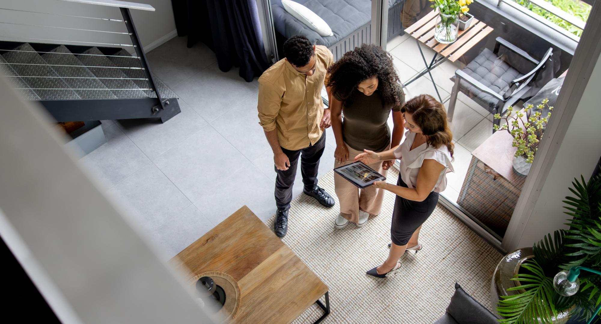 Couple talking to a landlord