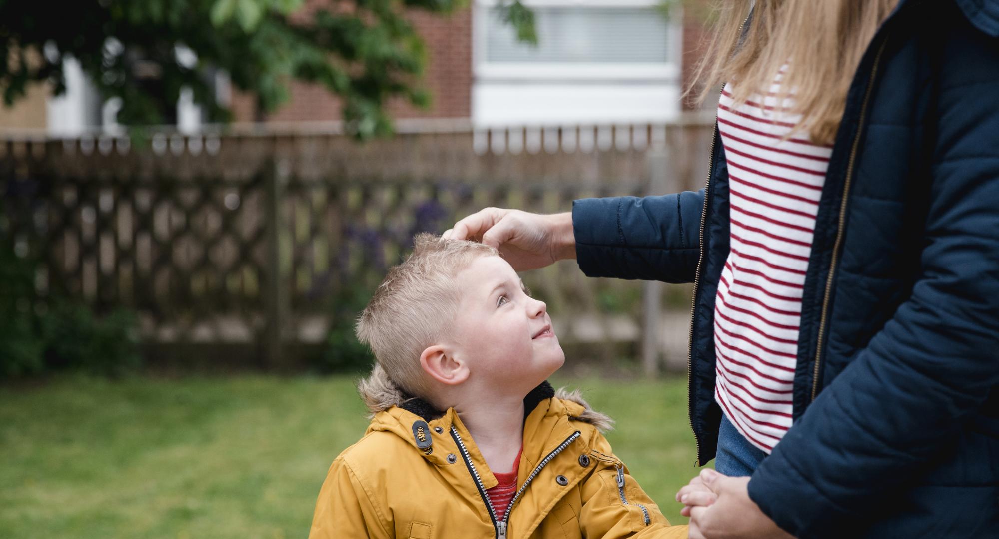 Little boy smiling at his mum