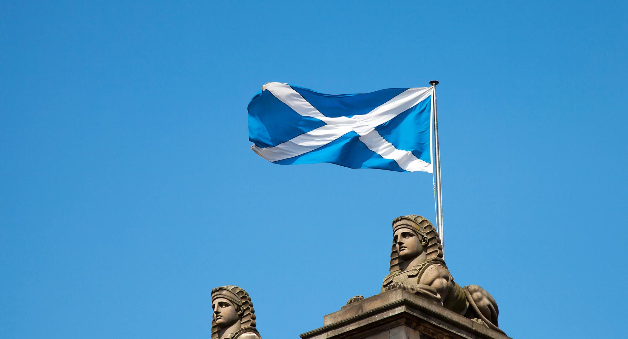 Scottish flag on a blue sky