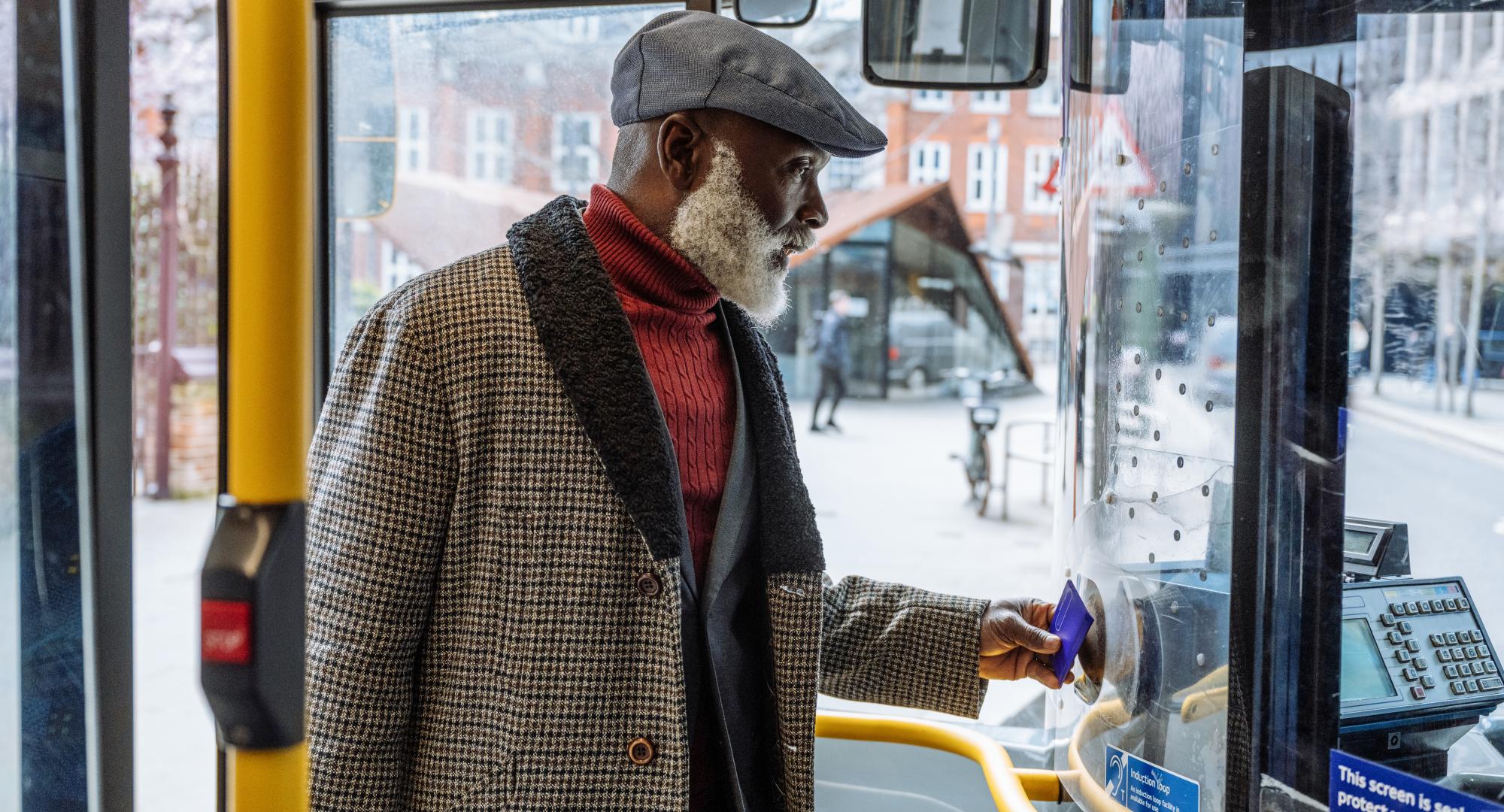 Man getting on a bus