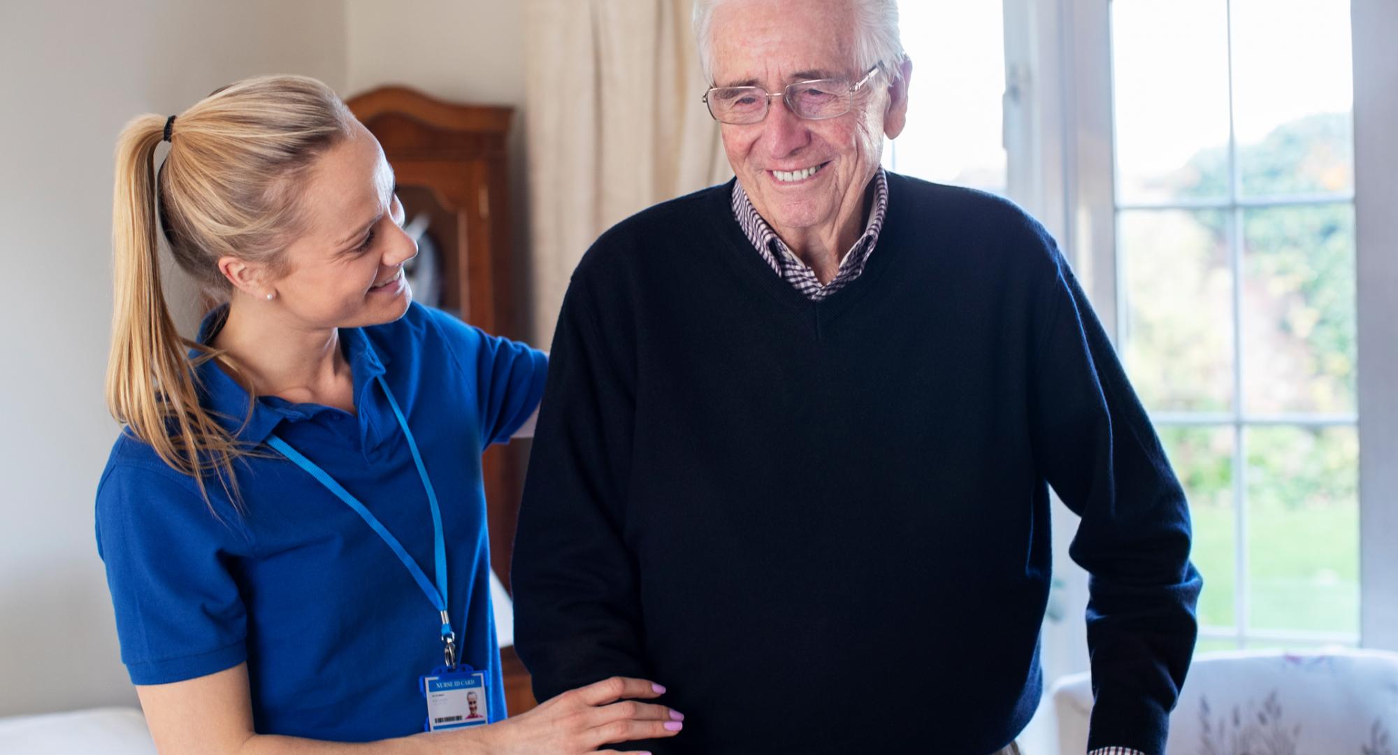 Carer with an elderly gentleman