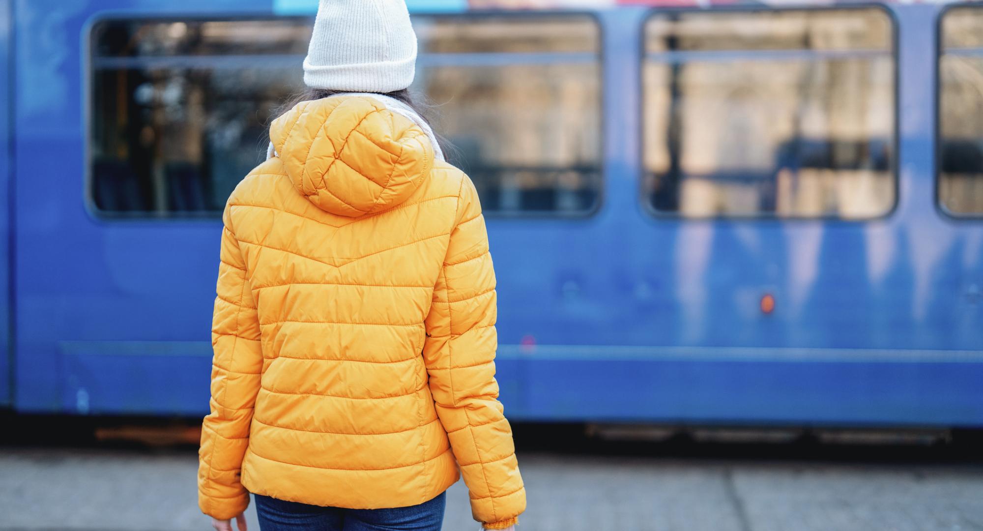 Woman waiting for a bus