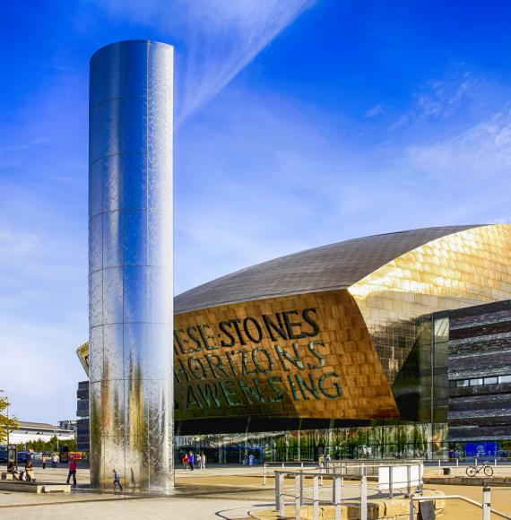 The Wales Millenium Centre building and Torchwood column in Cardiff.