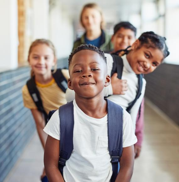 Multiracial school children together. 