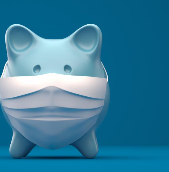 Piggy bank wearing a surgical mask.